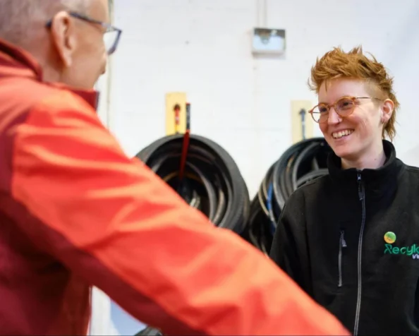 Recyke Y'Bike Employee looking happy at work